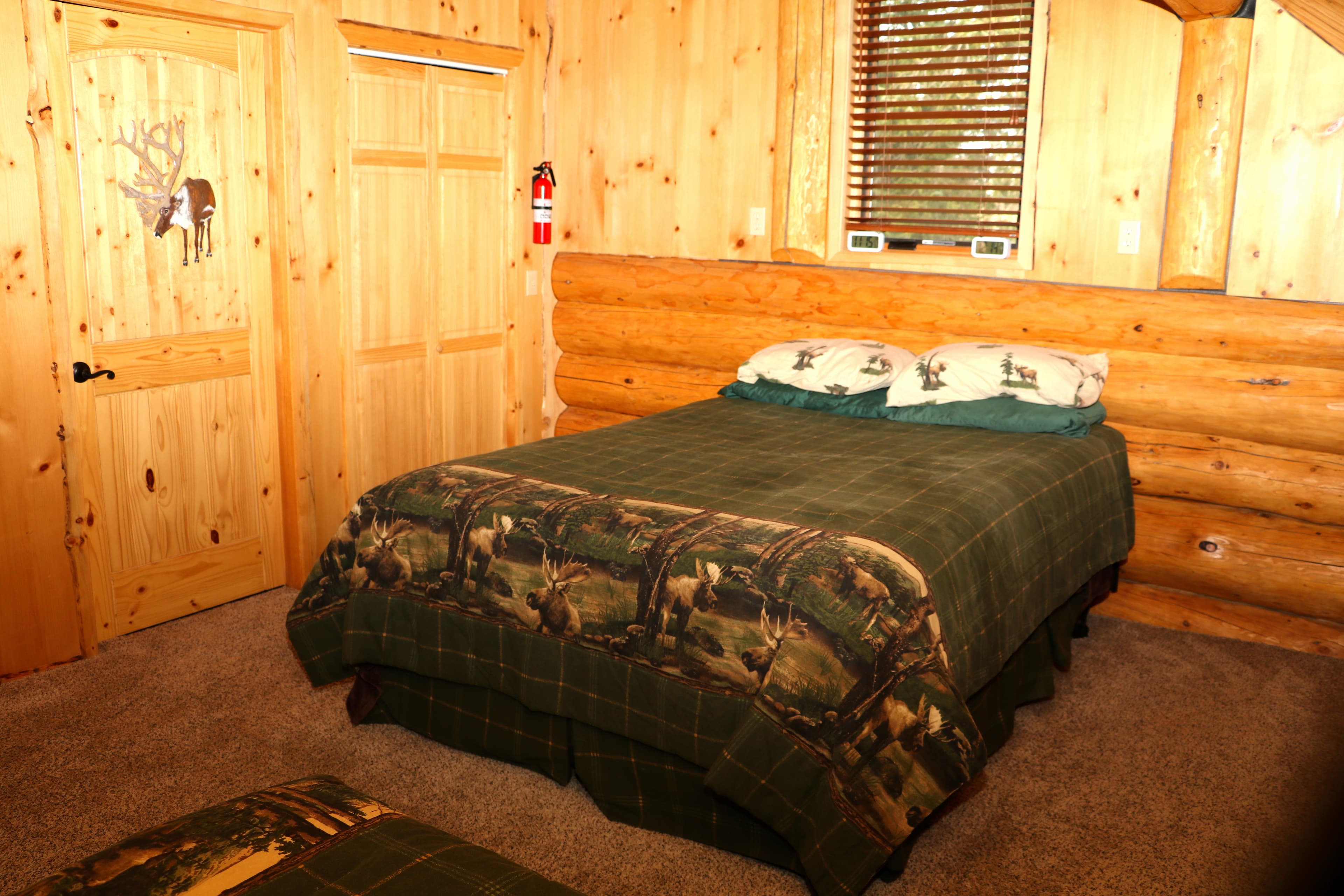 Cozy queen bedroom in loft.