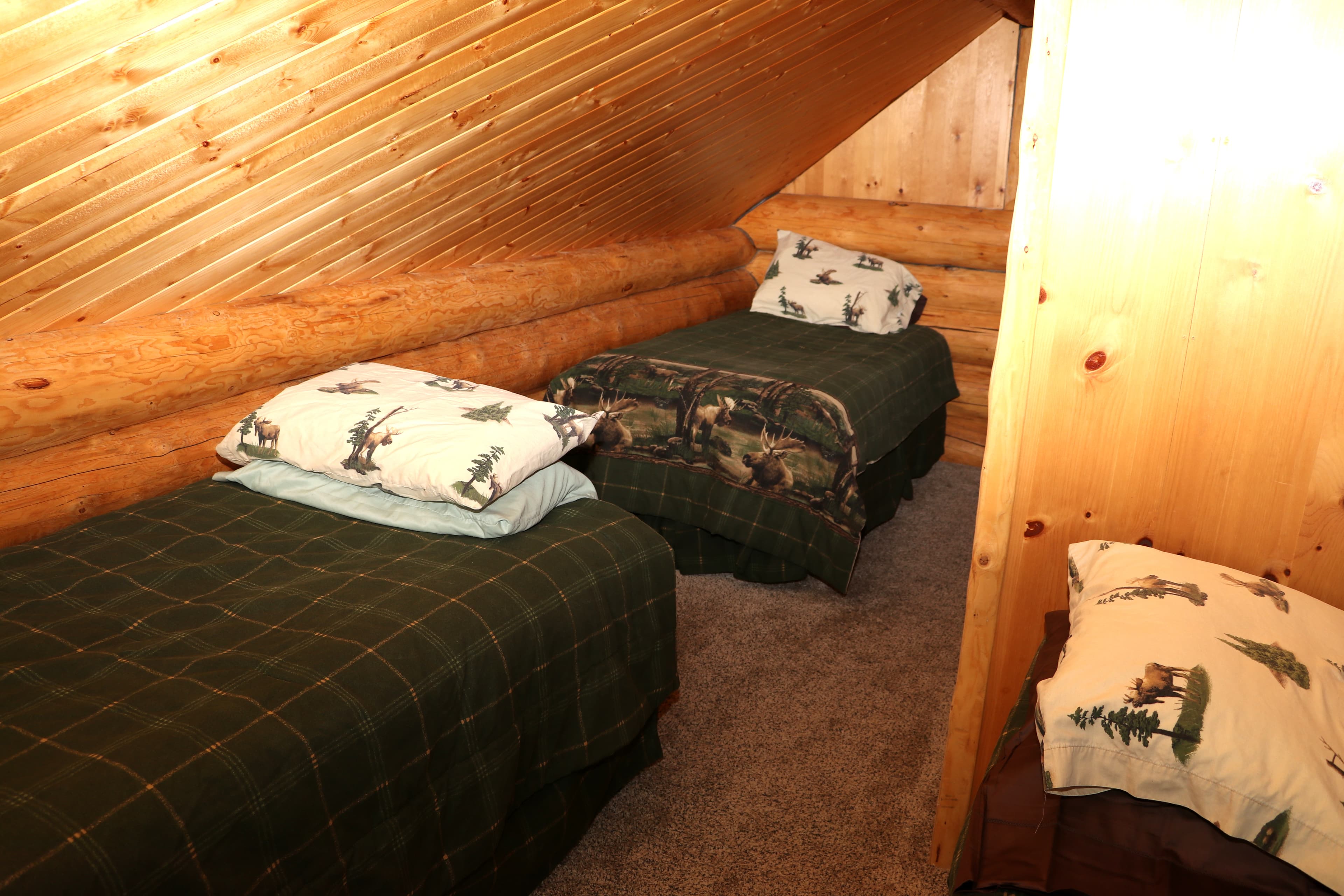 Two of the four loft twin beds
