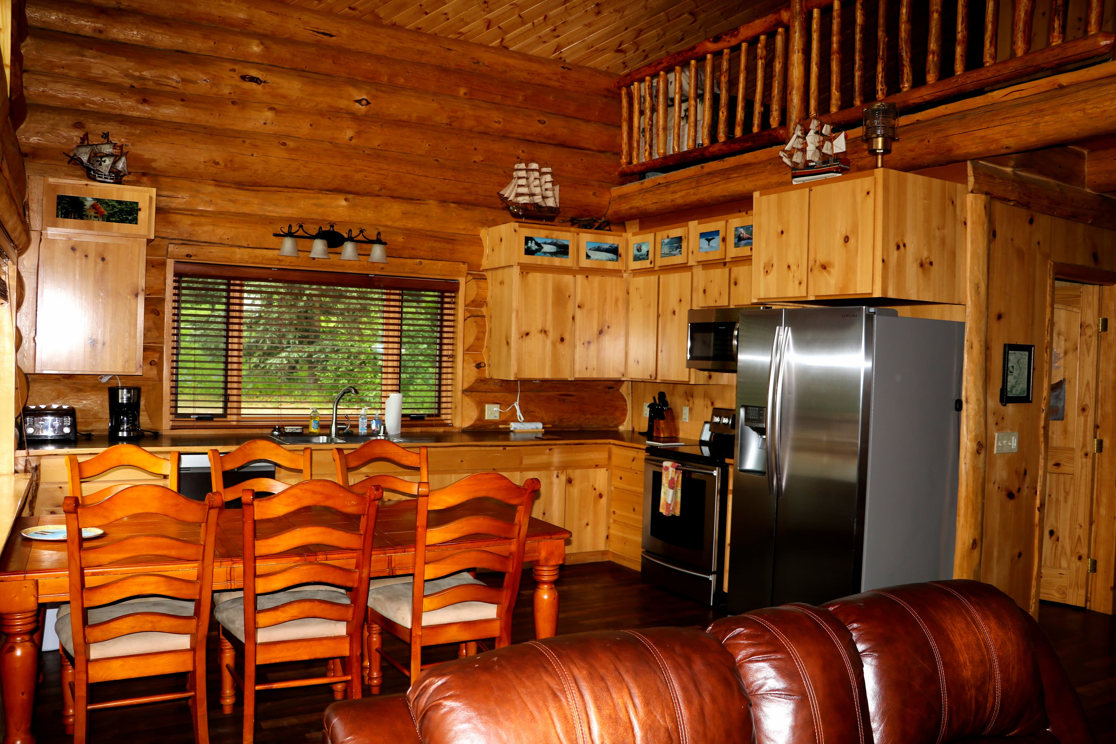 First Floor View 6 - Kitchen and dining area with loft overhead.
