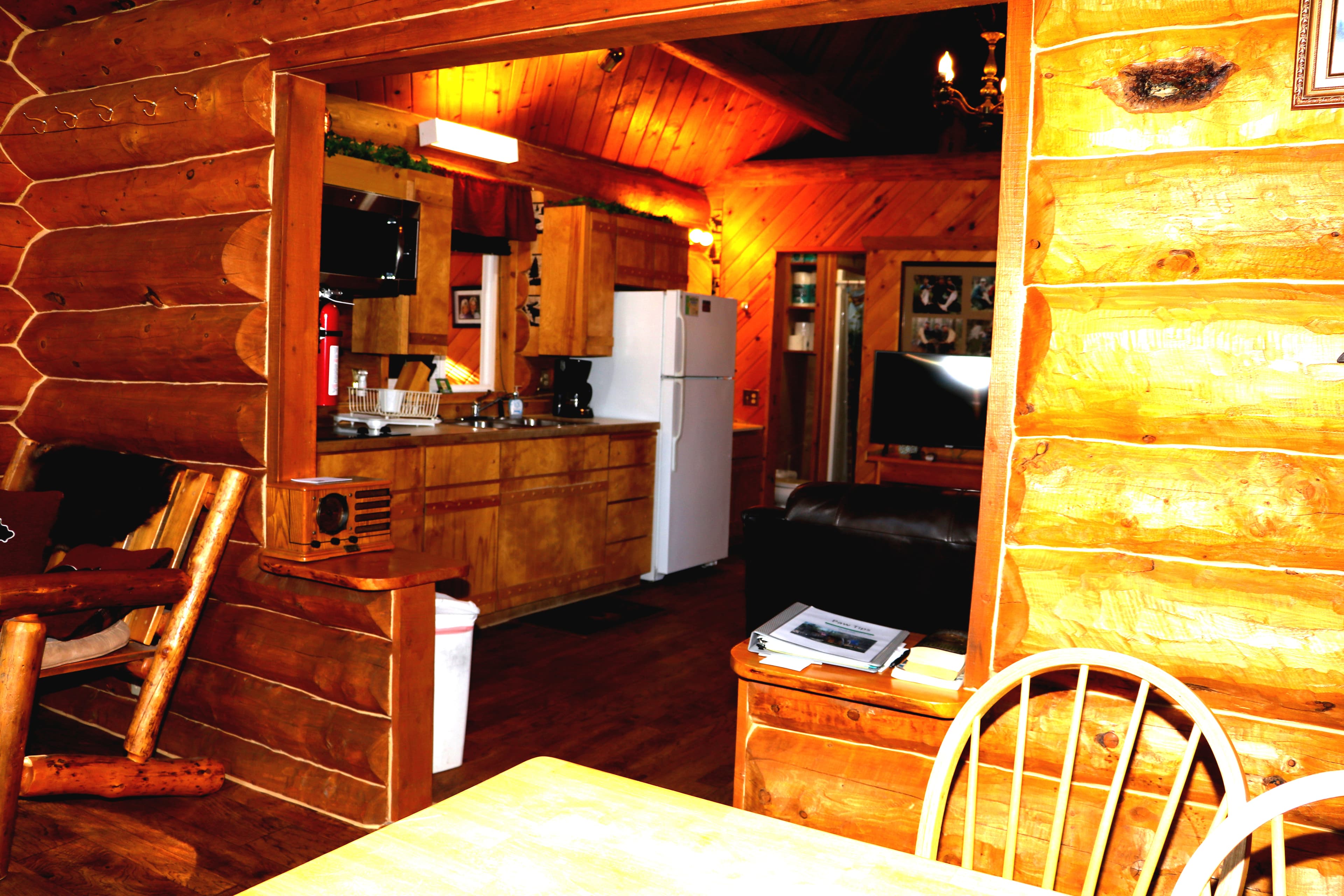 View looking through the entryway to the kitchen from the dining area.